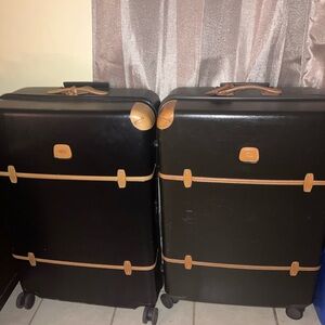 His and hers Bric's Black and Tan Travel Bags